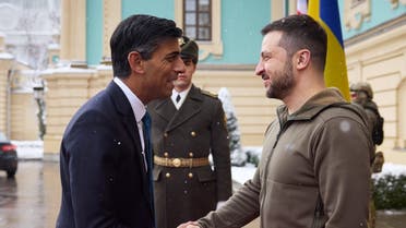 This handout picture taken and released by the Ukrainian presidential press service on November 19, 2022, shows Ukrainian President Volodymyr Zelenskyy (R) welcoming British Prime Minister Rishi Sunak prior their meeting in Kyiv. (Ukrainian presidential press service/AFP)