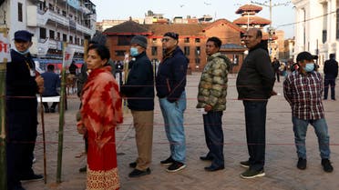 People stand in a queue to cast their votes during the general election, in Kathmandu, Nepal November 20, 2022. (Reuters)
