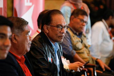 Anwar Ibrahim and other Pakatan Harapan leaders hold a news conference regarding Malaysia’s general election results at Subang Jaya, Malaysia, November 20, 2022. (Reuters)