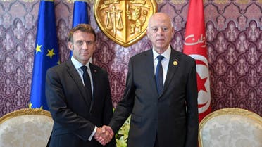 Tunisia’s President Kais Saied meets with French President Emmanuel Macron, in Djerba, where the 18th Francophonie Summit is taking place, Tunisia, on November 19, 2022. (Reuters)