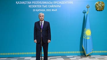 This handout photograph taken and released by the Kazakhstan's Presidential Press Service on November 20, 2022 shows incumbent Kazakh president Kassym-Jomart Tokayev speaking at a polling station during the country's presidential elections in Astana. (AFP)