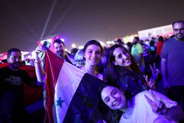 Fans celebrate the World Cup opening in Doha, Qatar. (Reuters)