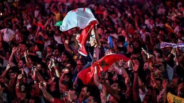 يفتخر مشجعو كرة القدم العرب بأول بطولة كأس عالم في الشرق الأوسط