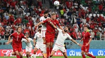 Denmark held by fired-up Tunisia in World Cup opener