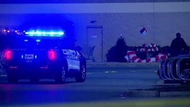 A screen grab shows the exterior of the Walmart store where a police car is parked at the scene of the shooting, November 22, 2022. (Reuters)