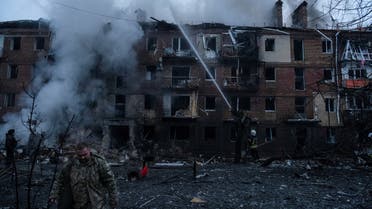 Rescuers work at a site of a residential building destroyed by a Russian missile attack, as Russia's attack on Ukraine continues, in the town of Vyshhorod, near Kyiv, Ukraine, November 23, 2022. REUTERS/Vladyslav Musiienko