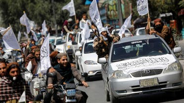 Taliban members drive in a convoy to celebrate the first anniversary of the withdrawal of U.S. troops from Afghanistan, along a street in Kabul, Afghanistan, August 31, 2022. (Reuters)