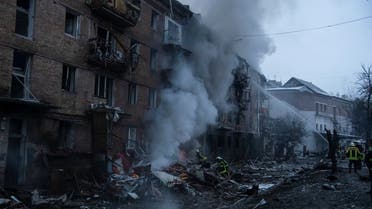 Rescuers work at a site of a residential building destroyed by a Russian missile attack, as Russia's attack on Ukraine continues, in the town of Vyshhorod, near Kyiv, Ukraine, November 23, 2022. REUTERS/Vladyslav Musiienko