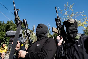 مسلحون فلسطينيون في الضفة الغربية - رويترز