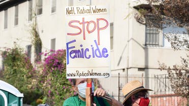 Women's rights activists and supporters rally outside the Consulate of Mexico in Los Angeles, California on April 6, 2021, denouncing the rise in femicides in Mexico and across Latin America. (AFP)