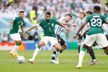 Argentina midfielder Rodrigo De Paul (7) battles for the ball against Saudi Arabia midfielder Salman Al-Faraj (7) during a group stage match during the 2022 World Cup at Lusail Stadium. (Reuters)