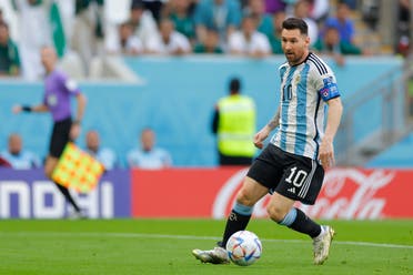 Argentina's No. 10 forward Lionel Messi shoots to score during the Group C soccer match of World Cup 2022 in Qatar between Argentina and Saudi Arabia.  (AFP)