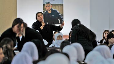 Members of the Israeli Druze minority attend the funeral of 17-year-old Tiran Fero, on November 24, 2022, in Daliyat al Karmel, around 20 kms southeast of Haifa. (AFP)