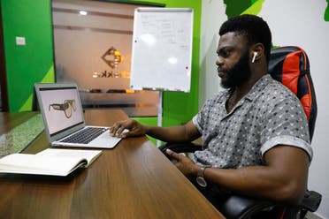 Kolawole Tomi, CEO of Vinsighte, displays an image of Visis hardware prototype, which aims at helping Visually impaired people read, on his laptop at his office in Lagos, Nigeria October 12, 2022. (Reuters)