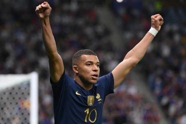 France’s forward #10 Kylian Mbappe celebrates during the Qatar 2022 World Cup Group D football match between France and Australia at the Al-Janoub Stadium. (AFP)