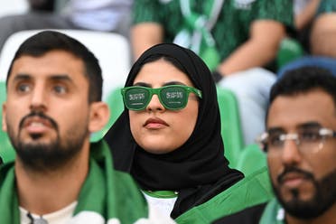 A Saudi Arabia supporter looks on ahead of the Qatar 2022 World Cup Group C football match between Poland and Saudi Arabia at the Education City Stadium in Al-Rayyan, west of Doha on November 26, 2022. (AFP)