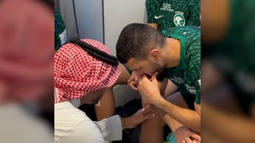 Minister of Sports Prince Abdulaziz bin Turki al-Faisal encouraging Saudi national team player Abdulelah al-Malki, whose defensive mistake allowed Poland to score another goal, November 26, 2022. (Screengrab)