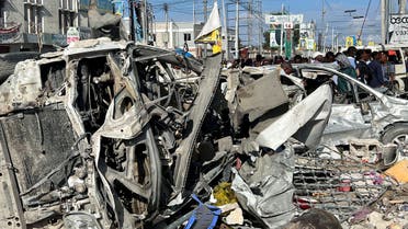 Wreckages of vehicles are destroyed at the scene of an explosion along K5 street in Mogadishu, Somalia October 30, 2022. (Reuters)