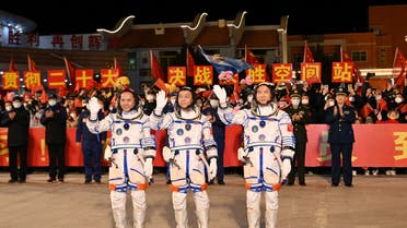 Astronauts Fei Junlong, Deng Qingming and Zhang Lu attend a see-off ceremony before the Shenzhou-15 spaceflight mission to build China's space station, at Jiuquan Satellite Launch Center, near Jiuquan, Gansu province, China September 29, 2022. (Reuters)