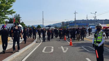 Members of the Cargo Truckers Solidarity union attend a protest in front of Hyundai Motor's factory in Ulsan, South Korea, June 10, 2022. (Reuters)