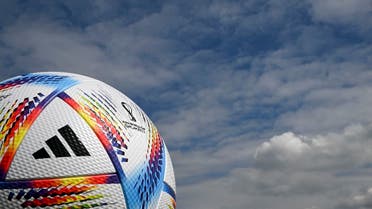 Picture taken on April 21, 2022 on the compound of the headquarters of German sports equipment maker Adidas in Herzogenaurach, southern Germany, shows a part of an oversized model of the official football of the Qatar held 2022 FIFA Football World Cup called “Al Rihla,” meaning “The Journey.” (AFP)