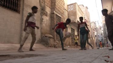 Boys playing football in Lyari, Karachi, Pakistan, November 28, 2022. (Reuters)