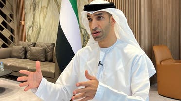 UAE Minister of State for Foreign Trade Thani Al Zeyoudi gestures during an interview with Reuters in Dubai, United Arab Emirates, on June 30, 2022. (Reuters)
