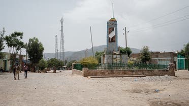 A few people walk at the town center in Samre, southwest of Mekele in Tigray region, Ethiopia, on June 20, 2021. (AFP)