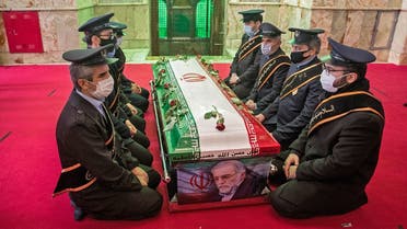 Iranian forces pray around the coffin of slain nuclear scientist Mohsen Fakhrizadeh during the burial ceremony at Imamzadeh Saleh shrine in northern Tehran, on November 30, 2020. (AFP)