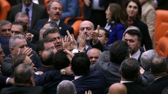 Turkish MP in intensive care after fight in parliament
