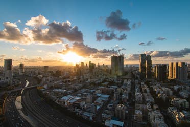 Skyscraper views of the sun setting on the District of Tel Aviv, Israel. (Unsplash, Daniel Lerman)