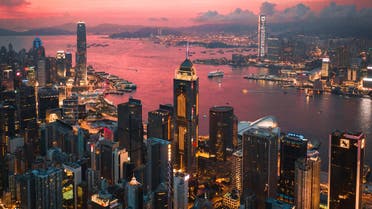 Cityscape of the Victoria Harbor region of Hong Kong during sunset. (Unsplash, Manson Yim)