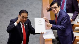Indonesia ratifies criminal code that bans sex outside marriage, among others