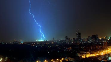 Lightning is seen over south Mumbai before the first pre-monsoon showers May 31, 2007 REUTERS/Arko Datta (INDIA)