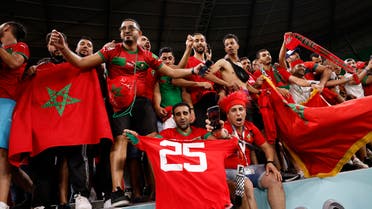 Morocco supporters celebrate the victory against Spain in penalty kicks in the round of sixteen match of the 2022 FIFA World Cup at Education City Stadium. (Reuters)