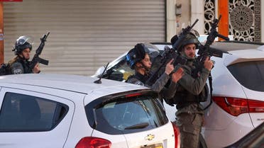 Israeli security forces deploy in the occupied West Bank city of Hawara, following an incident during which Palestinian Ammar Hadi Mufleh, 22, was reportedly shot dead by Israeli police, on December 2, 2022. (AFP)