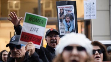 A man shouts out chants during a protest against gender-based violence in Iran, in front of the United Nations Children’s Fund (UNICEF) office in San Francisco, California, US, November 30, 2022. (Reuters)