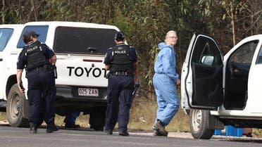 Police work near the scene of a fatal shooting, where police shot multiple people at a remote Queensland property after an ambush in which two officers and a bystander were also killed, in Wieambilla, Australia, on December 13, 2022. (AAP Image/Jason O'Brien via Reuters)