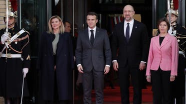 Ukrainian First Lady Olena Zelenska (2nd L), French President Emmanuel Macron (3rd L), Ukrainian Prime Minister Denys Shmyhal (2nd R) and French Foreign and European Affairs Minister Catherine Colonna (R) pose prior to the “Solidarity with Ukrainian people” conference, at the French Foreign Affairs ministry, in Paris, on December 13, 2022. (AFP)