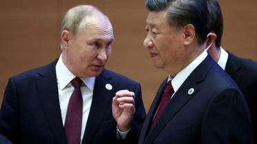 Russian President Vladimir Putin speaks with Chinese President Xi Jinping before an extended-format meeting of heads of the Shanghai Cooperation Organization summit (SCO) member states in Samarkand, Uzbekistan September 16, 2022. (Reuters)