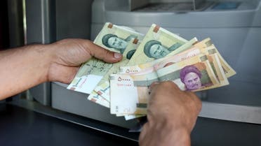 Iranian rials are displayed in Tehran on July 31, 2019. (AFP)