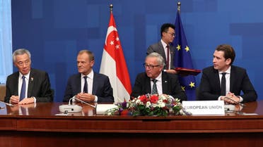 Singapore’s Prime Minister Lee Hsien Loong, European Commission President Jean-Claude Juncker, European Council President Donald Tusk and Austrian Chancellor Sebastian Kurz attend the ceremony for signing a Free Trade Agreement with Singapore during the EU-ASEM summit in Brussels, Belgium, on October 19, 2018. (File photo: Reuters)