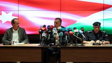 Jordanian Interior Minister Mazen Farrayeh speaks with Director of Public Security Directorate, Major General Obaidallah Maaytah and Minister of State for Media Affairs Faisal Shboul during a news conference in Amman, Jordan, on December 16, 2022. (Reuters)