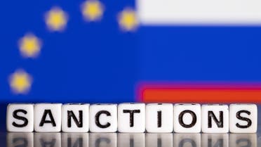 Plastic letters arranged to read Sanctions are placed in front the flag colors of EU and Russia in this illustration taken February 28, 2022. (Reuters)