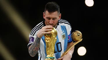 FIFA World Cup Qatar 2022 - Final - Argentina v France - Lusail Stadium, Lusail, Qatar - December 18, 2022: Argentina's Lionel Messi kisses the World Cup trophy after receiving the Golden Ball award as he celebrates after winning the World Cup. (Reuters)