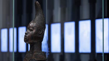  In this file photo taken on September 15, 2022 a sculpture with the title 'uhunmwun elao - memorial head of a queen mother' is on display next to other 'Benin Bronzes' during a press preview of the new exhibition halls ahead of their opening at the new Berlin Palace Humboldt Forum in Berlin. (AFP)