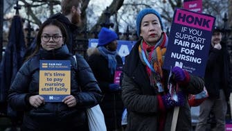 British nurses go on strike for second time, threaten further action in pay dispute 
