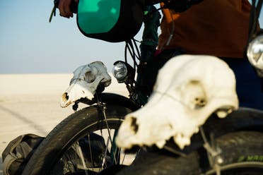 Animal skulls and flowers adorn the bicycles of Julia and Tilmann Schöllnhammer, who are undertaking an epic cycling expedition across the world. (Marco Ferrari/Al Arabiya English)