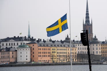 Flag at half mast at the official ceremony at Stockholm City Hall with one minute of silence at noon to remember the victims of Friday's terror attack on Drottninggatan, Stockholm, Monday, April 10, 2017.  (Reuters)