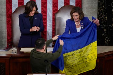 Zelensky presented the US Congress with a Ukrainian flag he had brought with him from the battlefield